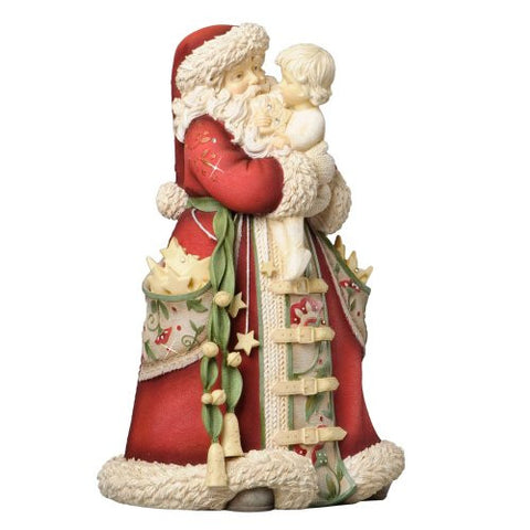 The Heart of Christmas Santa with Child Figurine