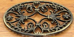 Oval Ornate Cast Iron Trivet (6 1/8" H. x 9 1/4" W. x 5/8" D)